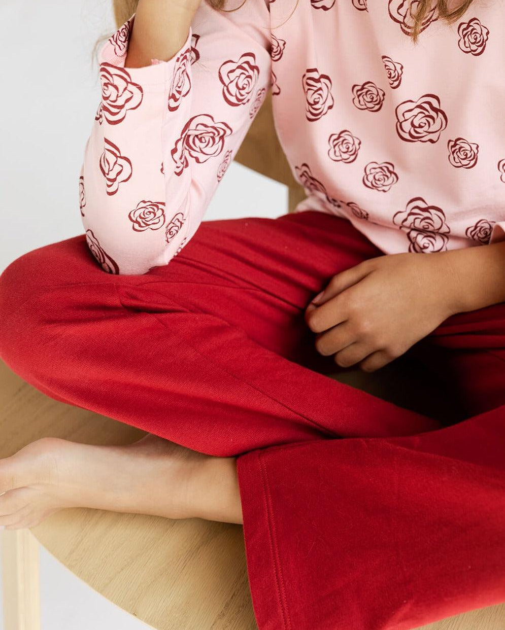 Red Sweatpants and Rose Long Sleeve Shirt